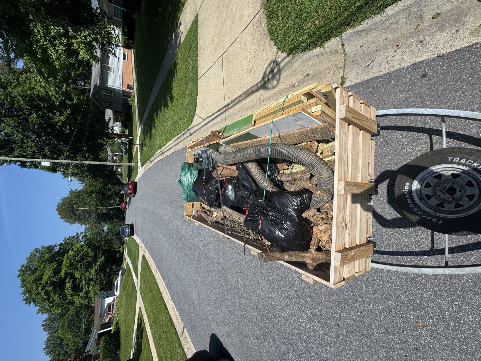 Trailer loaded with mixed household items for haul away